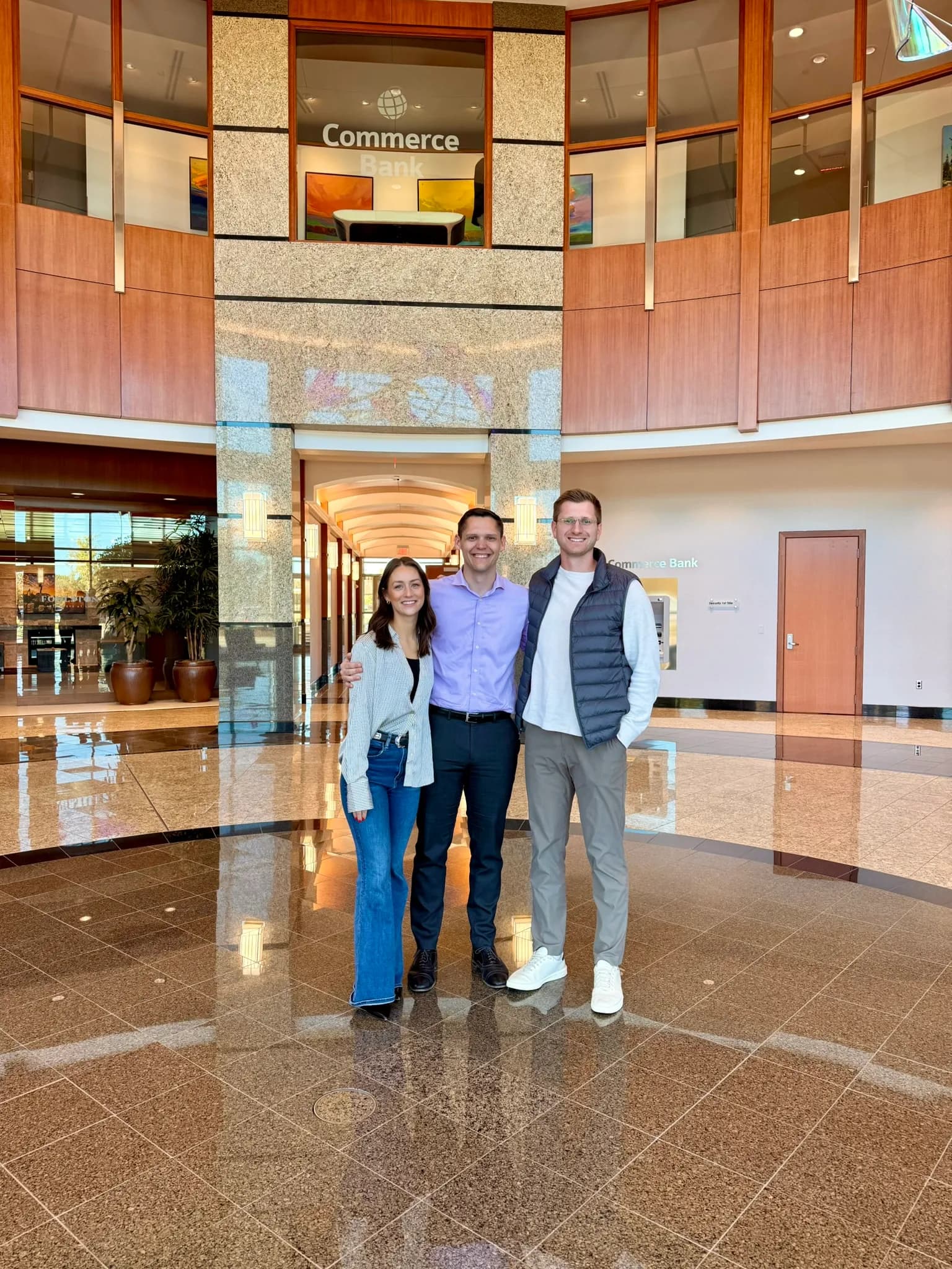 Clients celebrating in the lobby after closing